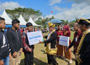 HUT Muna Barat, BPJamsostek Serahkan Santunan ke 10 Ahli Waris Pekerja Rentan