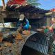 Babinsa Koramil Unaaha Bersama Warga Gotong Royong Bangun Jembatan Armco di Konawe